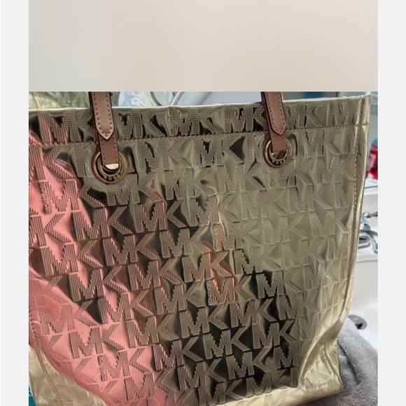 Michael Kors Women's Gold Metallic XL Tote Bag .
16” W x 11” T x 6.5” D - Picture 4 of 16